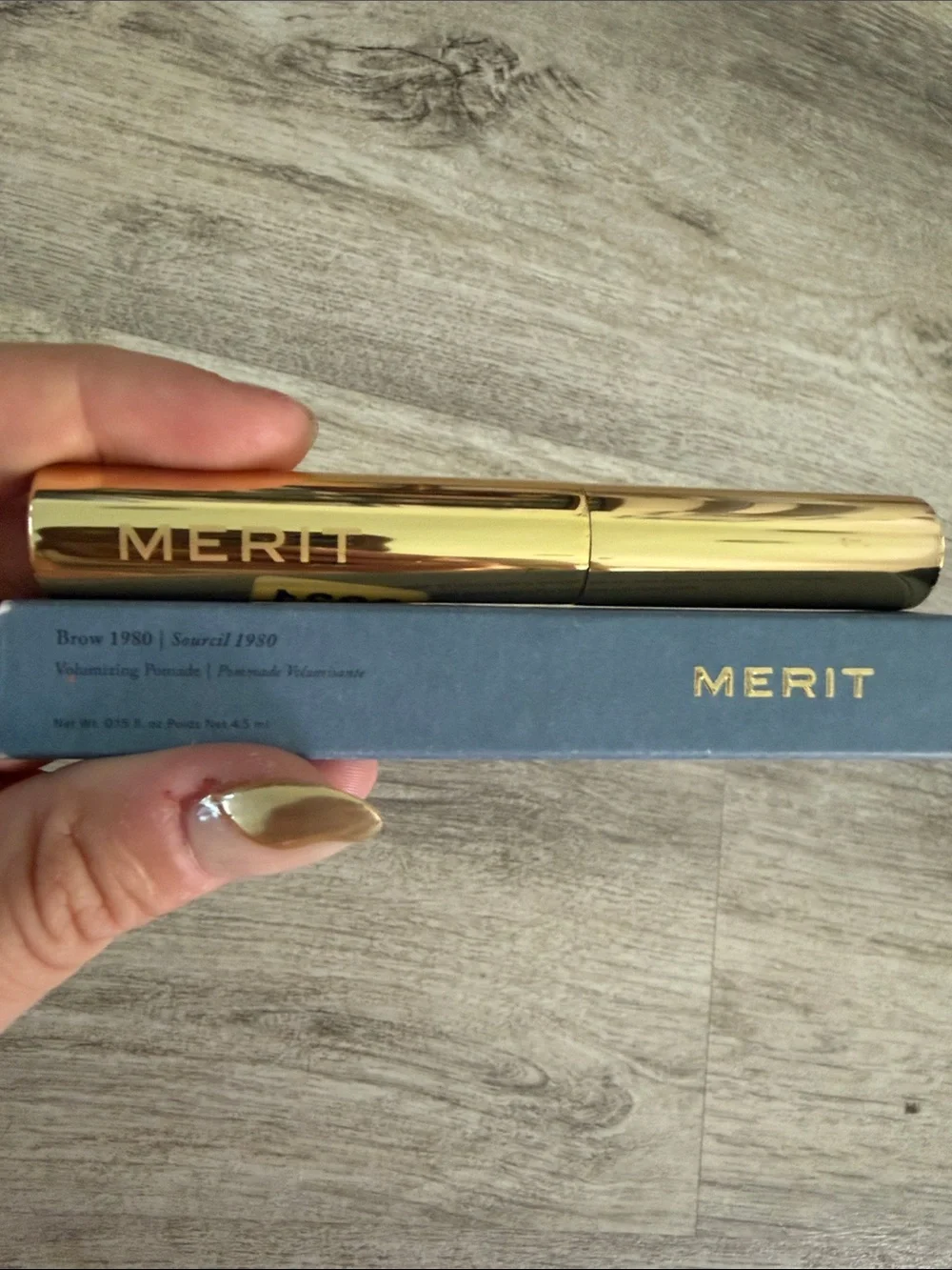 MERIT Volumizing Brow Pomade in light brown